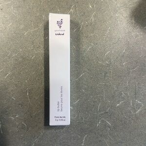 Lip butter.  Color is quick getaway.  New.